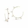 Couplet Vacation Shop Les Perles Pink Sapphire Hoops